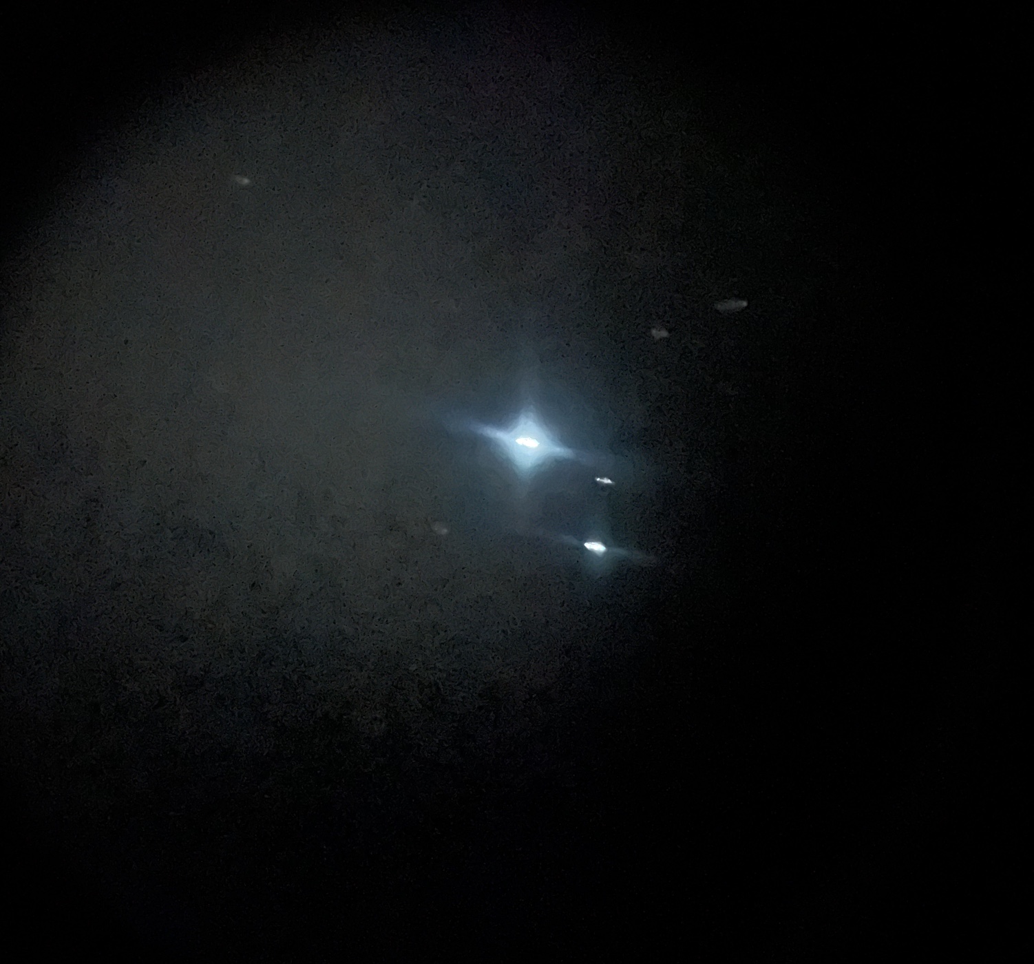 A shot of stars through the lens of a telescope